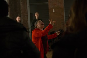 Arielle Rosales invites attendees to use their voices to create a group rhythm. 